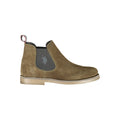 Green leather men's boot by U.S. POLO ASSN., featuring sturdy design and classic style, shown in a close-up image.