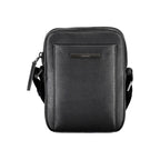 Black Calvin Klein polyurethane men's shoulder bag with adjustable strap and sleek design, ideal for everyday use.