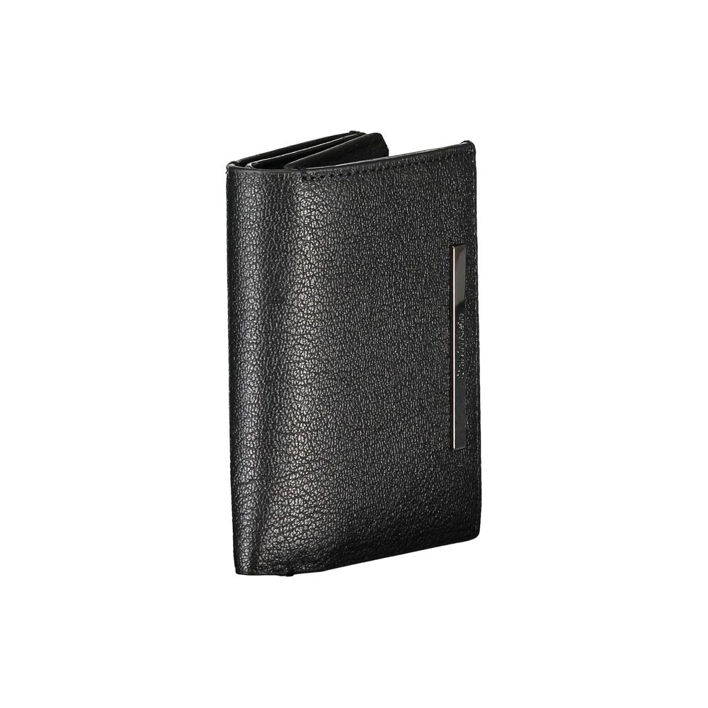 Calvin Klein sleek black leather wallet with coin purse, featuring multiple card slots and compact design for everyday use.