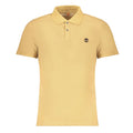 Timberland beige cotton men's polo shirt featuring a classic collar and short sleeves, laid flat on a neutral background.