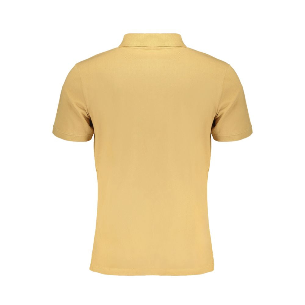 Timberland beige cotton men's polo shirt with a classic collar and short sleeves, displayed on a hanger.