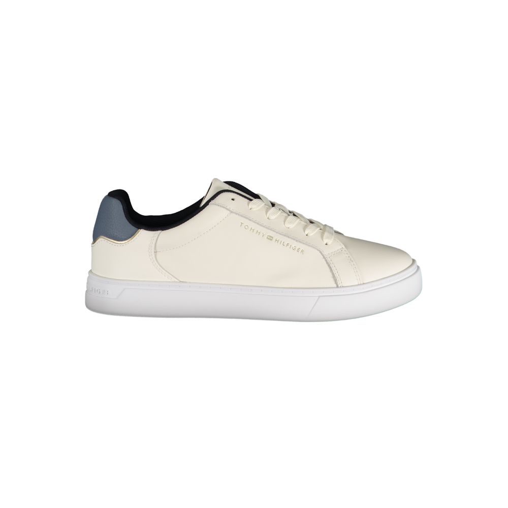 Beige leather women's sneaker by Tommy Hilfiger with white sole and subtle branding for casual, stylish footwear.