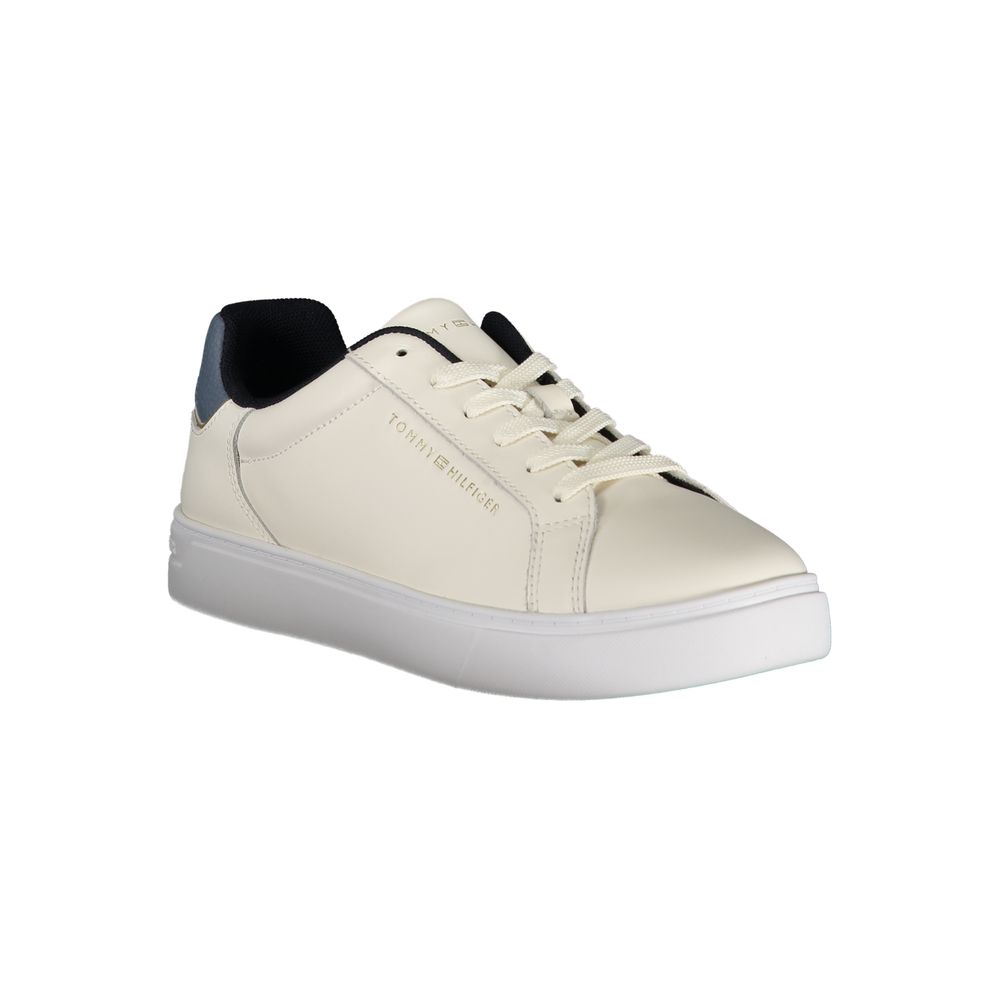 Beige leather women's sneaker by Tommy Hilfiger with white rubber sole and subtle branding, casual and stylish footwear.