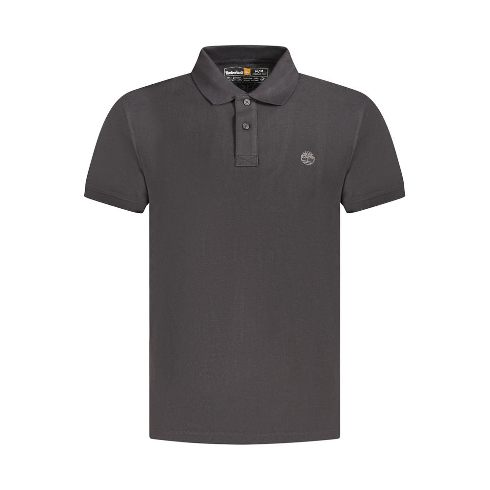 Black Timberland men's cotton polo shirt displayed on a hanger, featuring a classic collar and short sleeves.