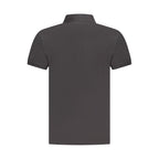 Black Timberland cotton men's polo shirt with collar and short sleeves, featuring a classic fit and subtle branding.