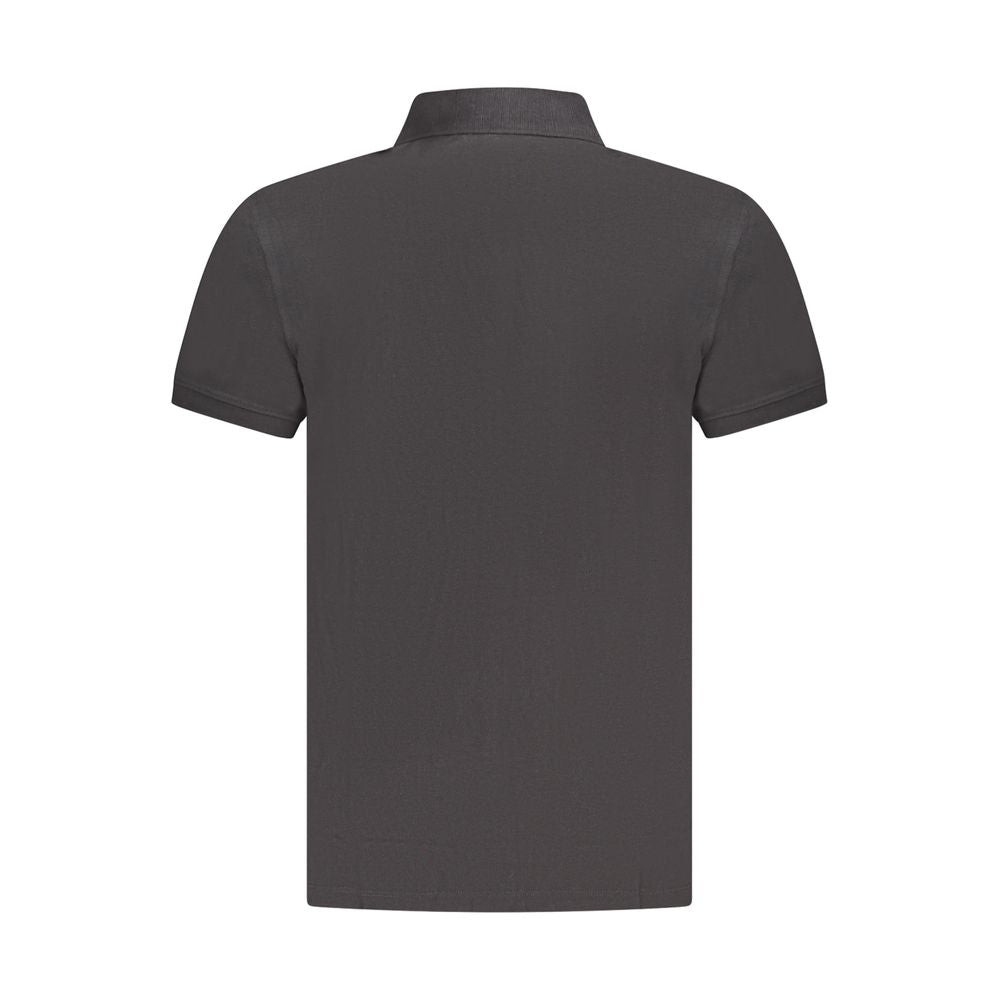Black Timberland cotton men's polo shirt with collar and short sleeves, featuring a classic fit and subtle branding.