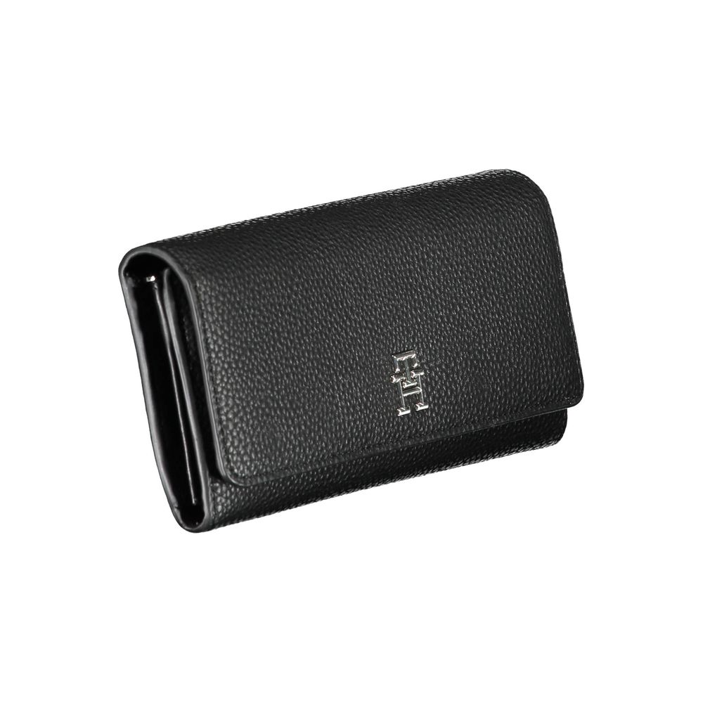 Tommy Hilfiger black polyurethane women's wallet with logo detail and multiple card slots, stylish and functional accessory.