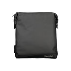Calvin Klein black shoulder bag with contrast details, elegant design, and structured shape, perfect for stylish everyday wear.