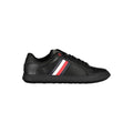 Black leather men's sneaker by Tommy Hilfiger featuring sleek design and signature branding, shown from a side angle.