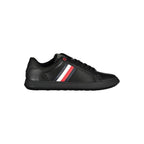 Black leather men's sneaker by Tommy Hilfiger featuring sleek design and signature branding, shown from a side angle.