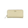 Calvin Klein beige polyurethane women's wallet with sleek design and multiple card slots, featuring the brand logo on the front.