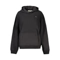 Black cotton women's sweatshirt by Calvin Klein featuring a relaxed fit and minimalist design, shown on a model.