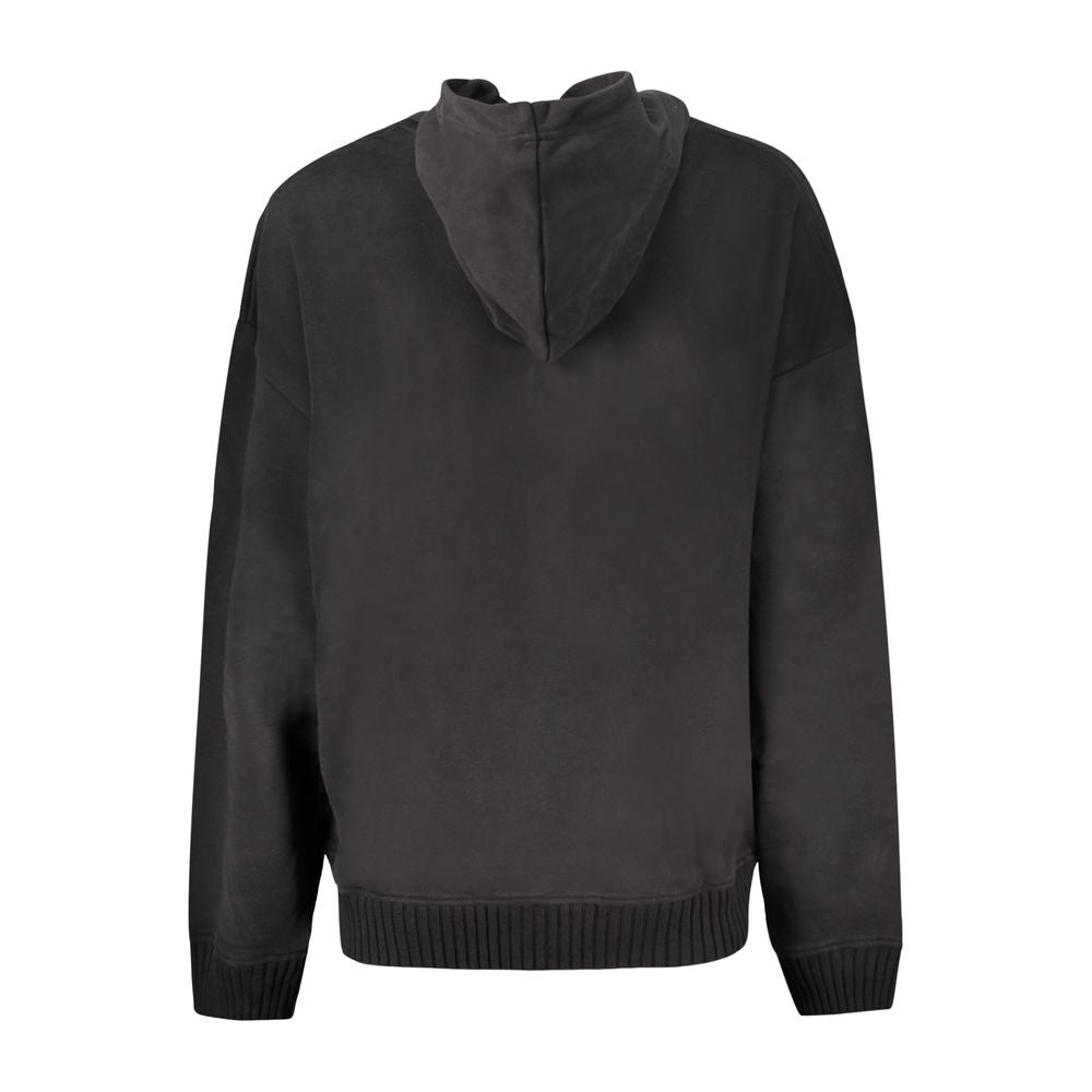Black Calvin Klein cotton women's sweatshirt with a relaxed fit and crew neckline, displayed on a hanger.