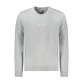 Tommy Hilfiger men's gray polyester sweater displayed flat, showcasing a classic crew neckline and ribbed cuffs.