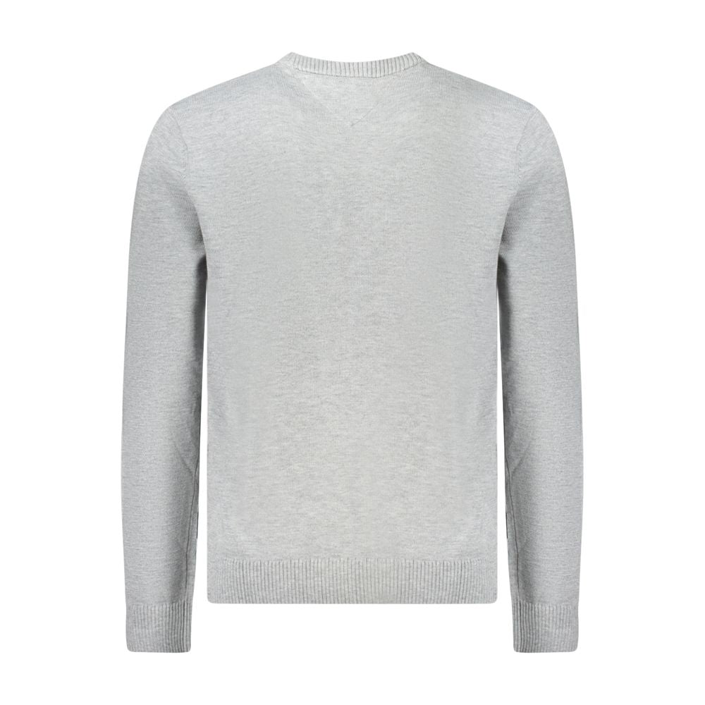 Tommy Hilfiger men's gray polyester sweater with crew neck and ribbed cuffs, stylish and comfortable for casual wear.