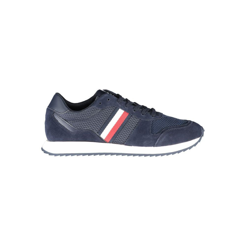 Tommy Hilfiger blue polyester men's sneaker with white sole and laces, casual athletic shoe on a white background.