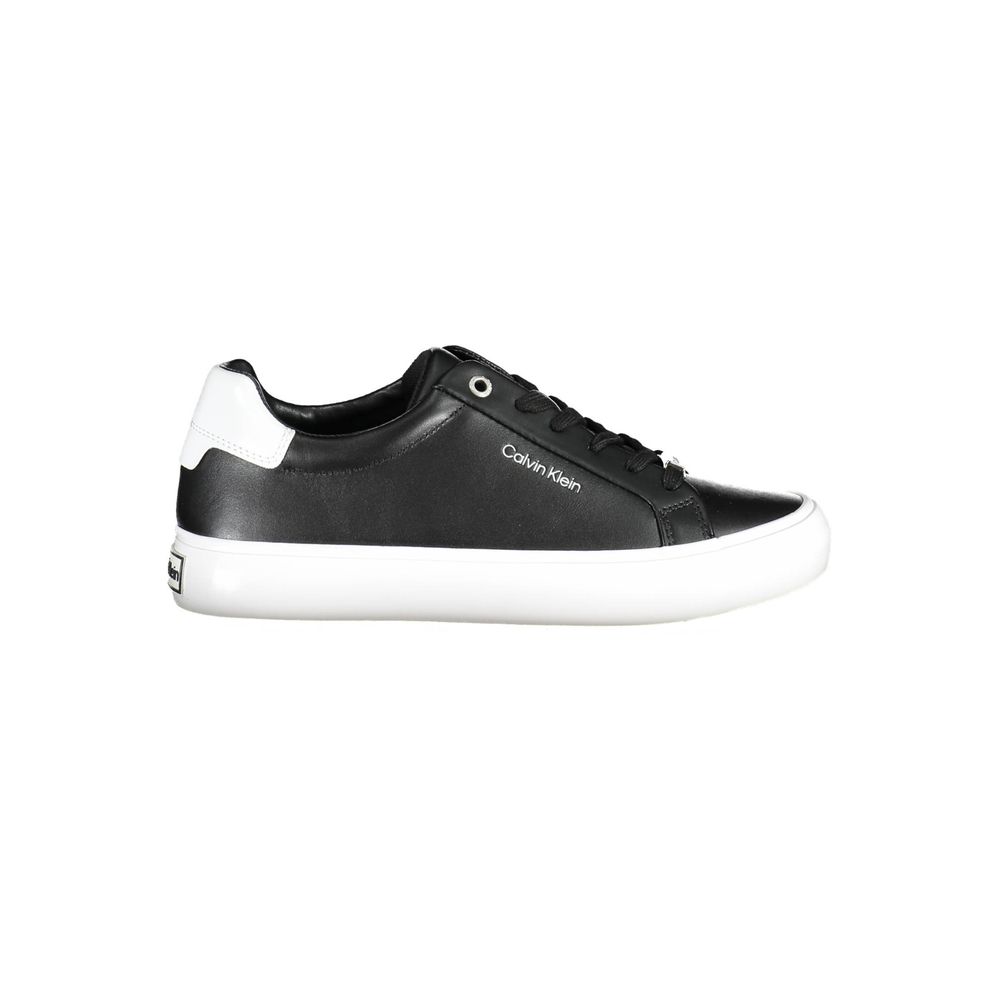Black leather women’s sneaker by Calvin Klein with white rubber sole and sleek modern design.