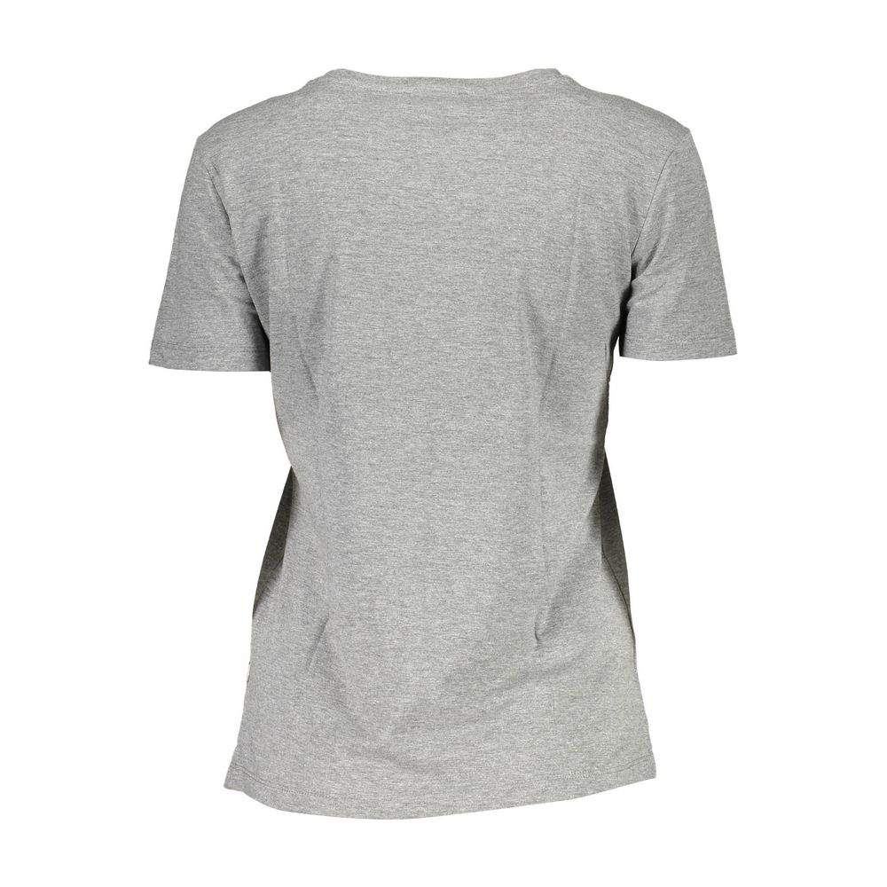 Gray cotton women's T-shirt by Guess Jeans with a relaxed fit and classic crew neckline, shown on a plain background.