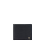 Black calf leather Ferragamo Bos Taurus wallet with sleek design and subtle branding, featuring multiple card slots and a secure bill compartment.