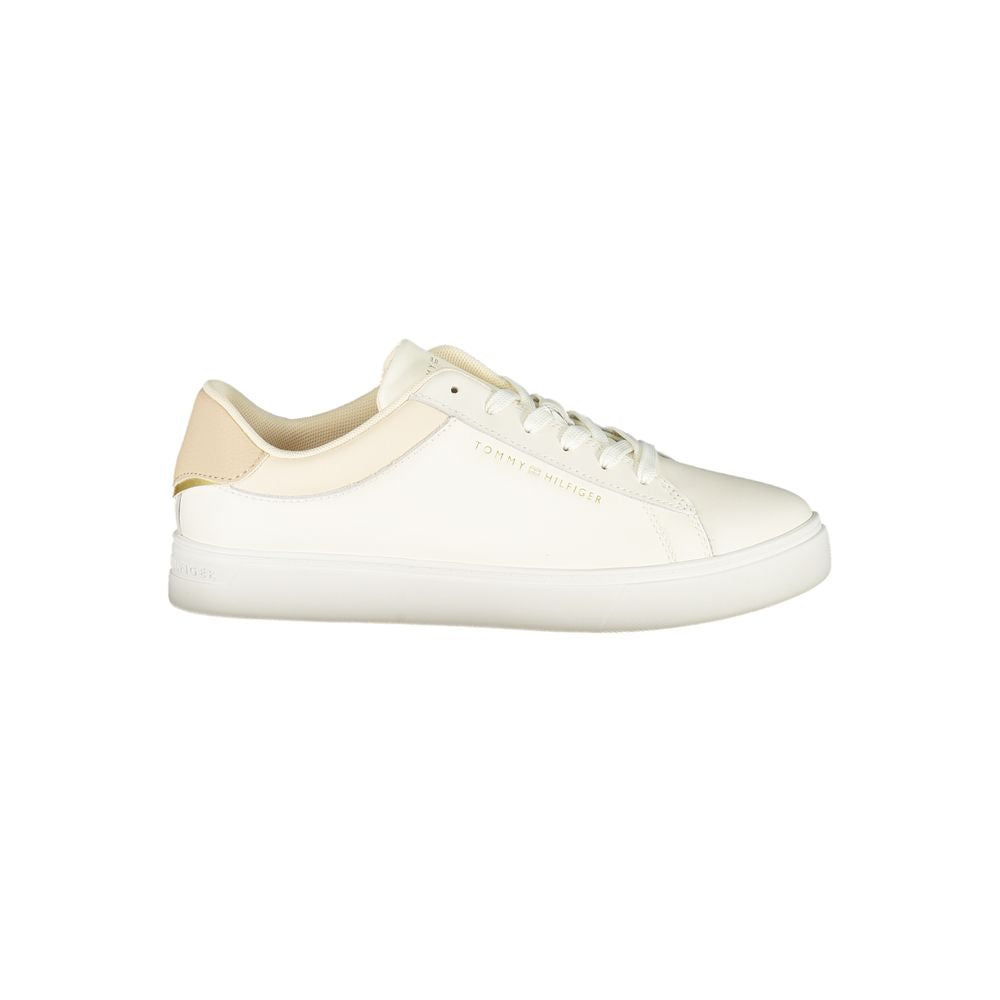 Tommy Hilfiger beige women's sneaker with polyurethane upper and stylish design, featuring laces and a casual sole.