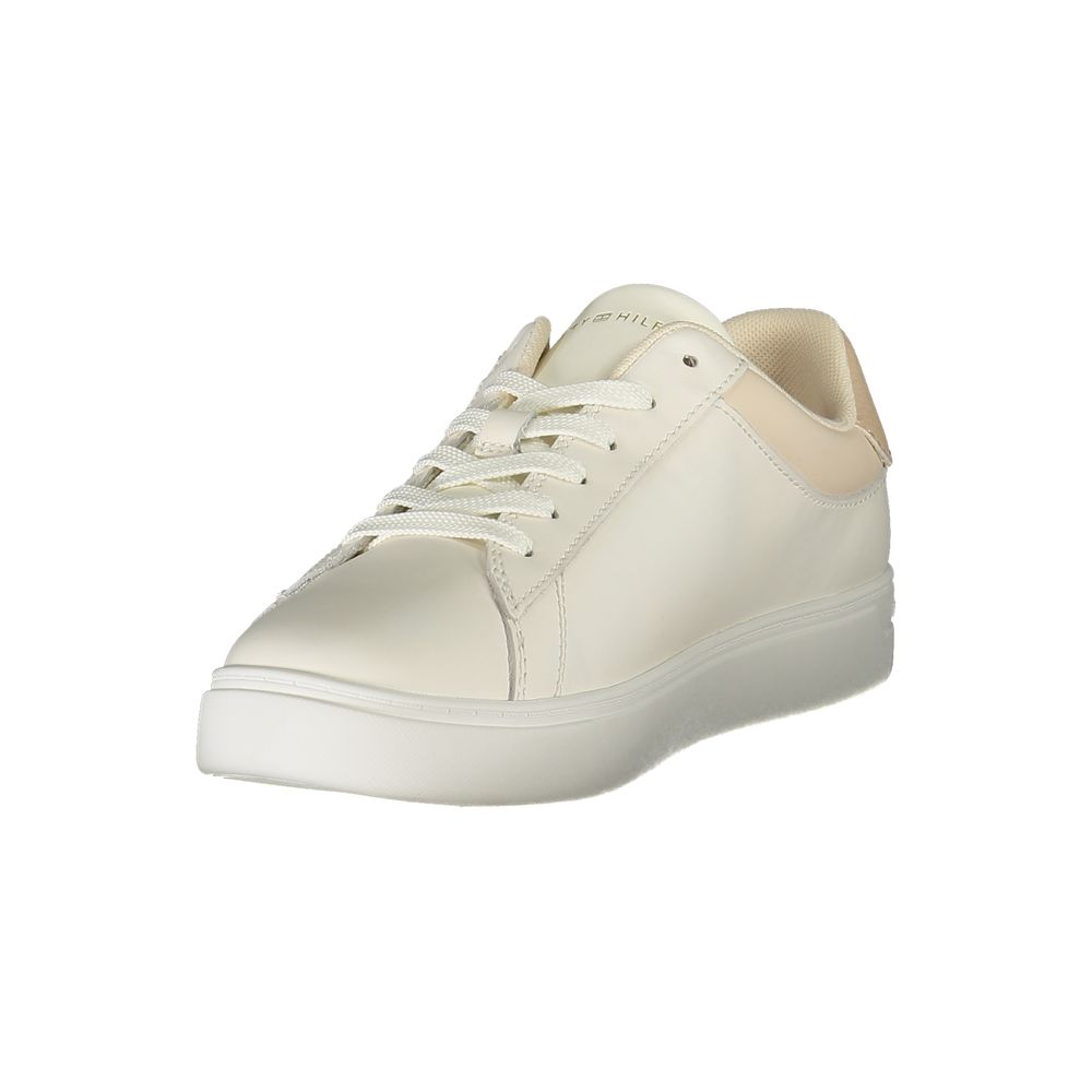 Beige Tommy Hilfiger women's sneaker made of polyurethane with white sole and logo details, casual and stylish footwear.