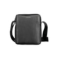 Calvin Klein Nero polyester men's shoulder bag with adjustable strap and minimalist design against a neutral background.