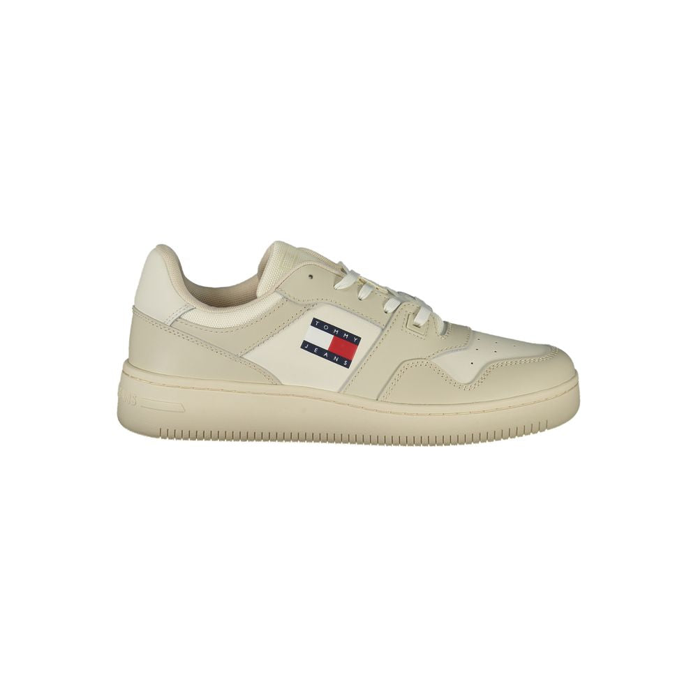 Tommy Hilfiger beige polyester athletic sneakers with white soles and laces, sporty footwear for active wear.