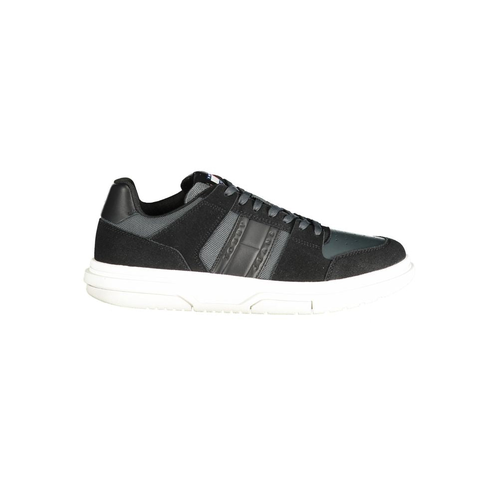 Black leather men's sneaker by Tommy Hilfiger with white sole and subtle logo details.