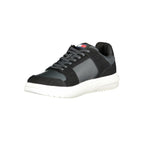 Tommy Hilfiger black leather men's sneaker with white sole and logo details, stylish casual footwear.