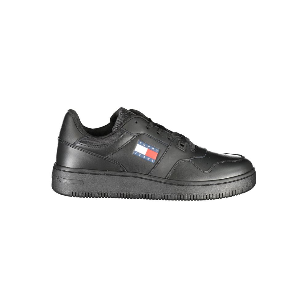 Black leather men's sneaker by Tommy Hilfiger with white rubber sole and sleek design, ideal for casual and sporty looks.