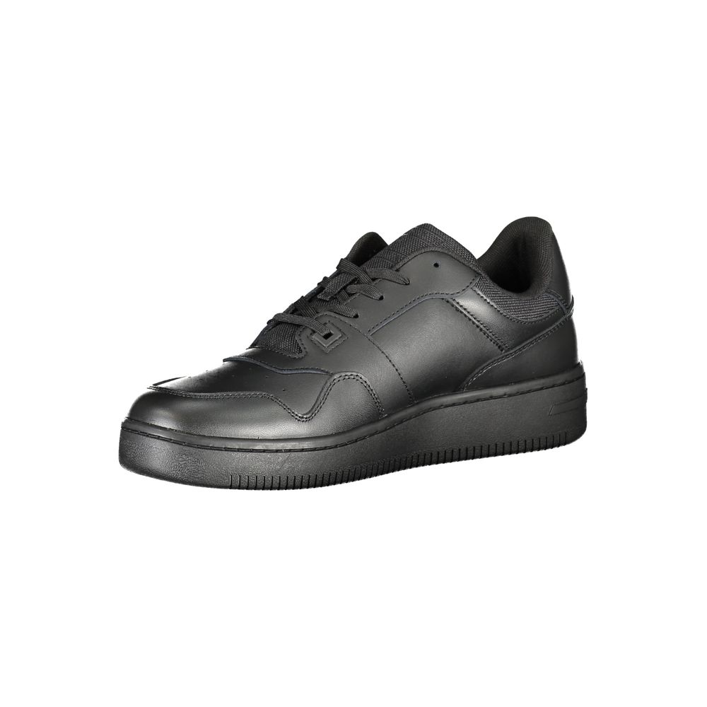 Tommy Hilfiger black leather men's sneaker with white sole, stylish casual footwear, detailed stitching and brand logo visible.