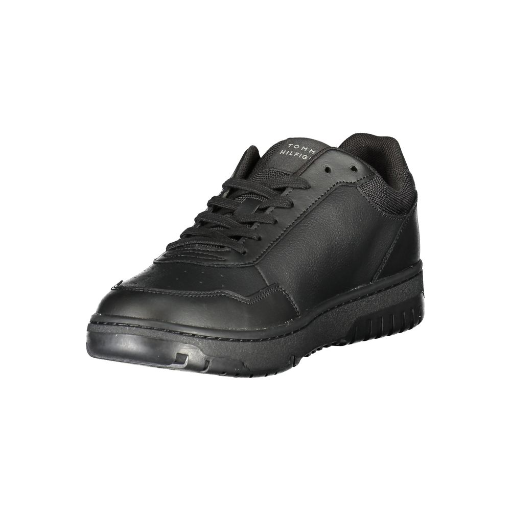 Black leather men's sneaker by Tommy Hilfiger featuring a sleek design and classic branding details.