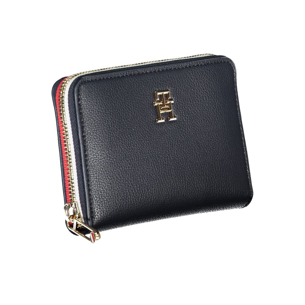 Tommy Hilfiger blue polyurethane women's wallet with multiple card slots and a sleek design.