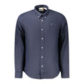 Timberland blue linen men's shirt displayed on a hanger, featuring a classic collar and button-down front.