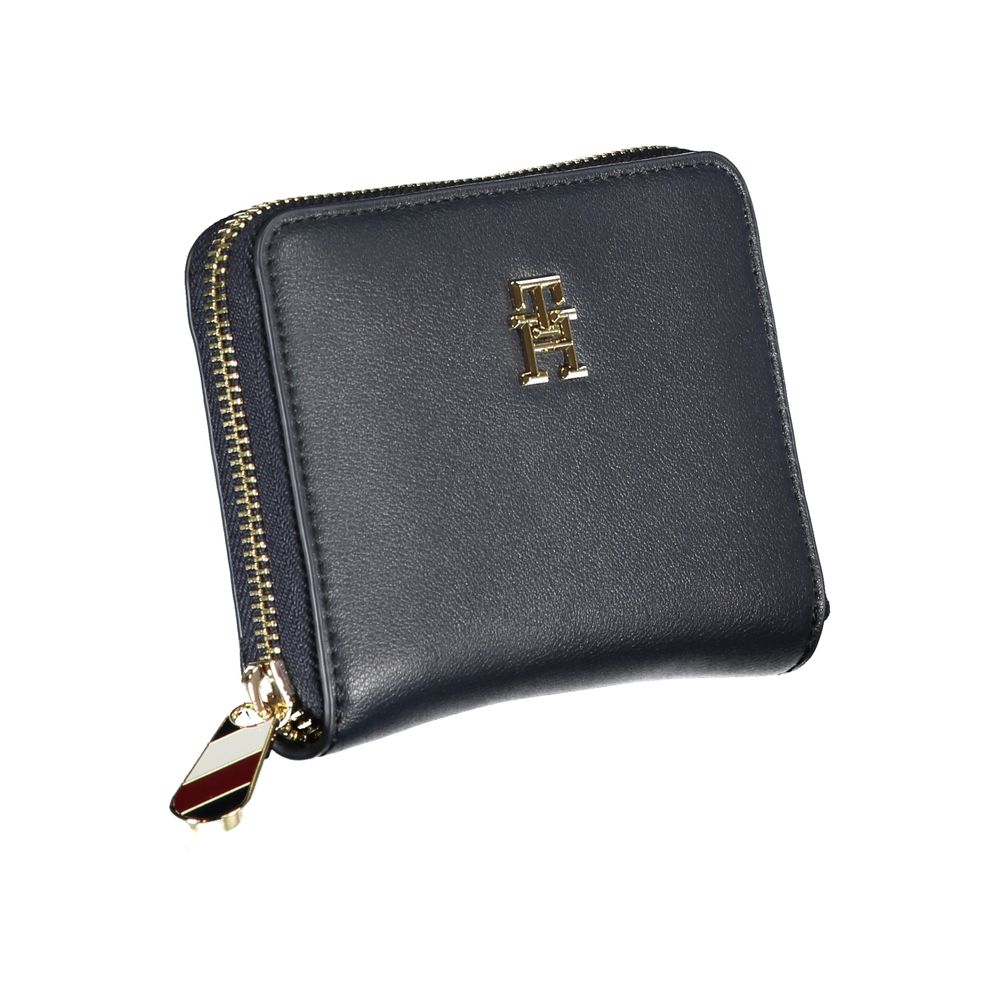 Tommy Hilfiger blue polyurethane women’s wallet with multiple card slots and a sleek, stylish design.
