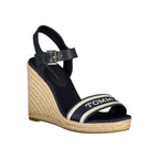 Tommy Hilfiger blue leather women's wedge sandal with ankle strap and open toe, stylish summer footwear.