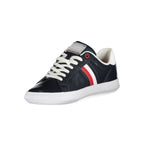Tommy Hilfiger blue leather men's sneaker with white sole and navy accents, casual footwear for everyday wear.
