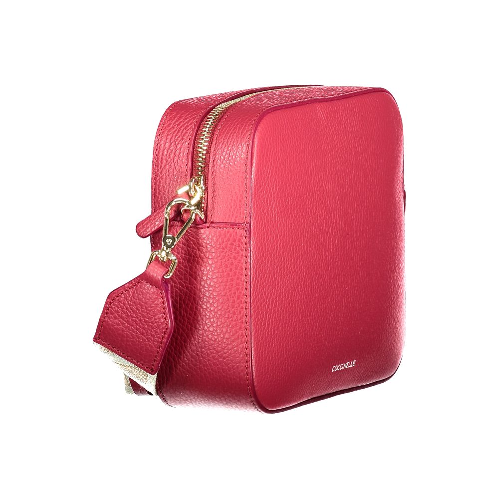 Coccinelle Rosso leather woman bag with gold-tone hardware and sleek design, featuring a rounded shape and top handle.
