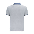 Timberland blue cotton men's polo shirt with collar and short sleeves, casual and comfortable men's fashion top.