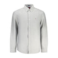 Tommy Hilfiger men's Grigio cotton shirt displayed on a hanger, featuring a classic button-up design and the iconic Tommy Hilfiger logo.