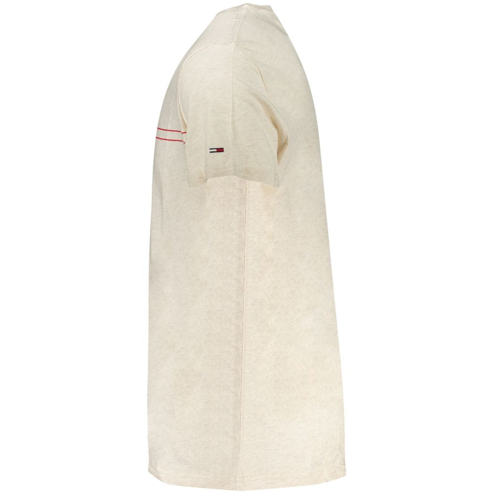 Beige cotton men's T-shirt by Tommy Hilfiger featuring a classic fit and subtle brand logo on the chest.