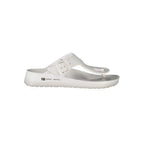 Norway 1963 white plastic women's ciabatta shoes with textured design and slip-on style.