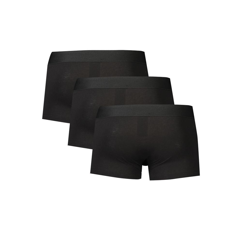 Black polyester men's boxer briefs by Bikkembergs, close-up view showing comfortable waistband and smooth fabric.