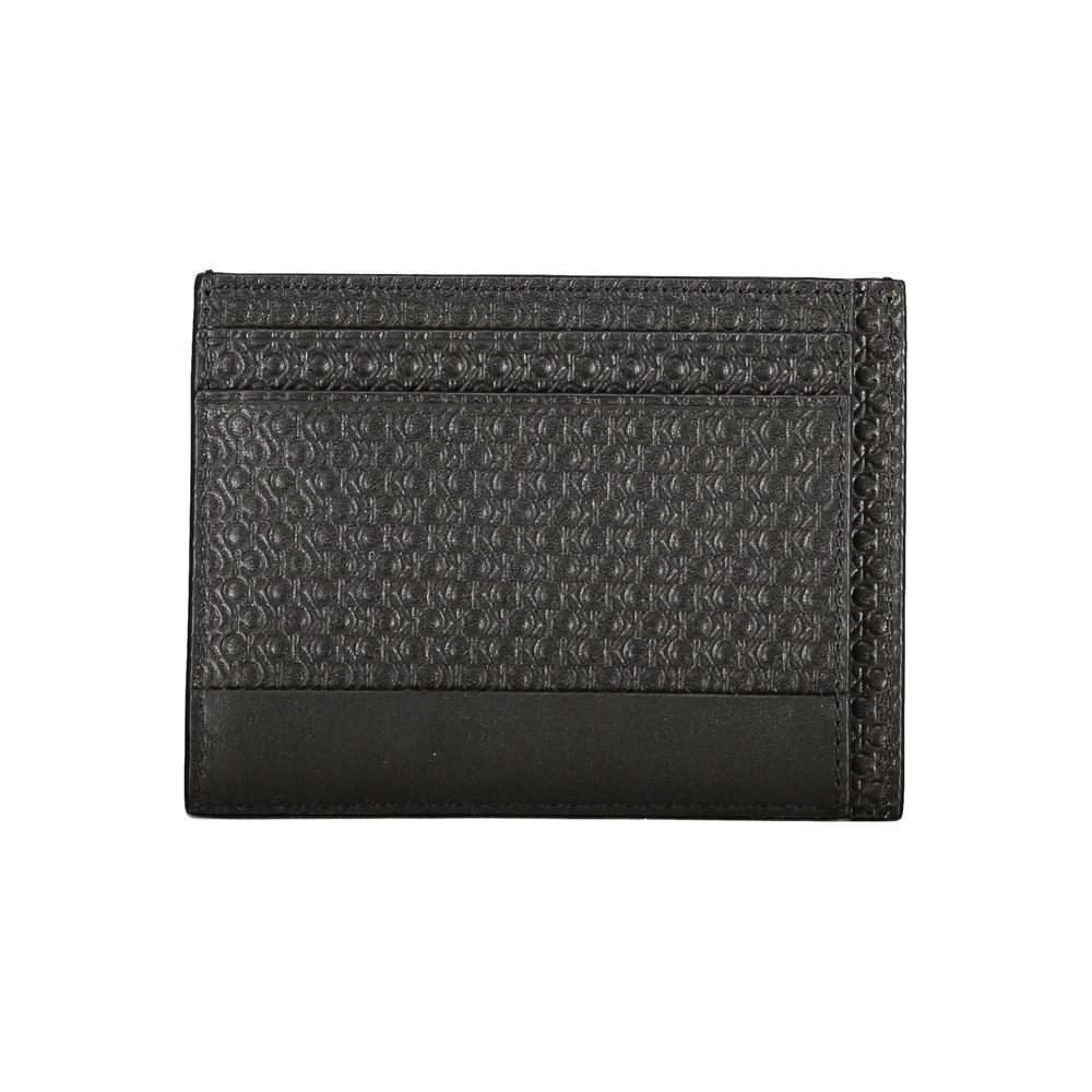 Calvin Klein black polyester men's shoulder bag with adjustable strap and sleek design, featuring the brand logo.