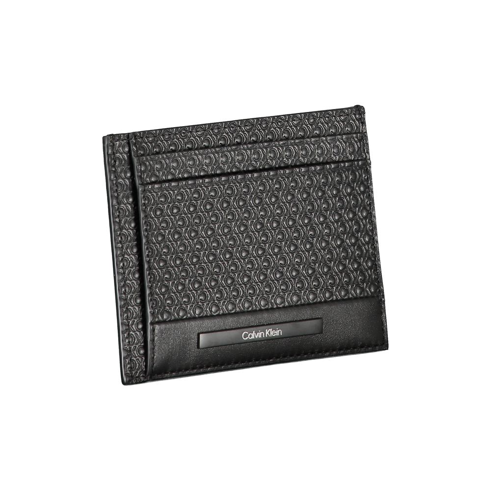 Calvin Klein black polyester men's shoulder bag with adjustable strap and minimalist design, ideal for everyday use.