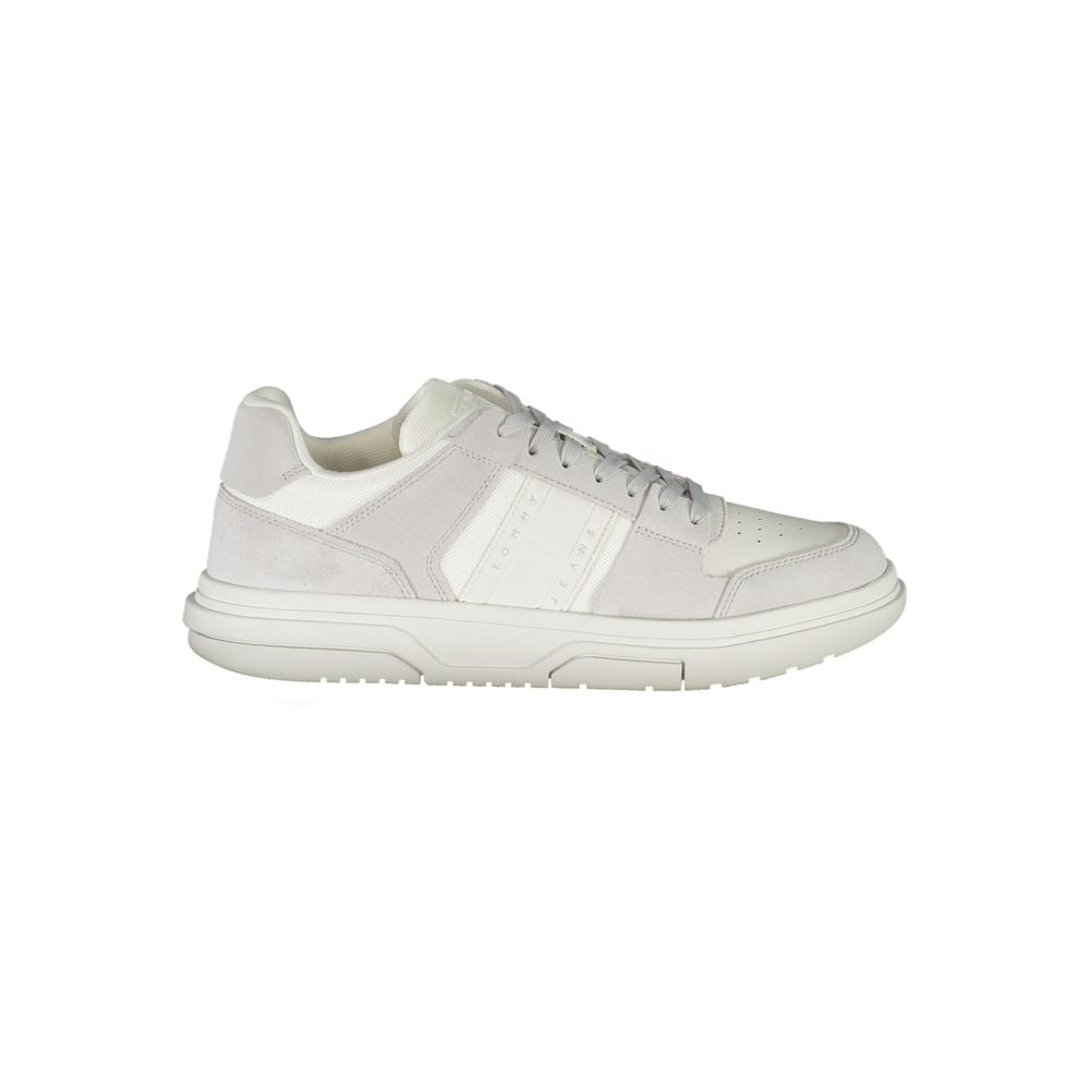 White Tommy Hilfiger men's polyurethane sneakers with sporty design and stylish laces, perfect for casual wear.