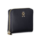 Tommy Hilfiger blue women's wallet made of polyurethane with a sleek design and branded logo on the front.