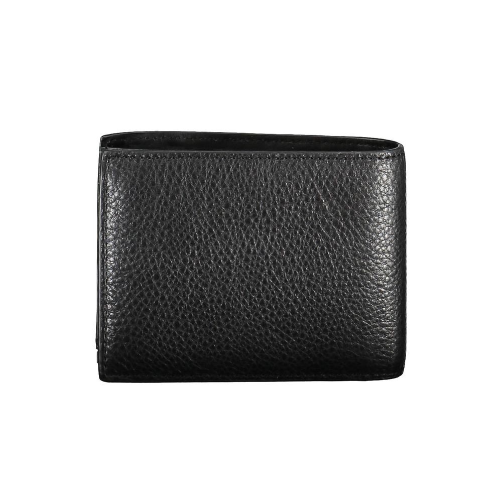 Calvin Klein black leather men's wallet with multiple card slots and a sleek, minimalist design.