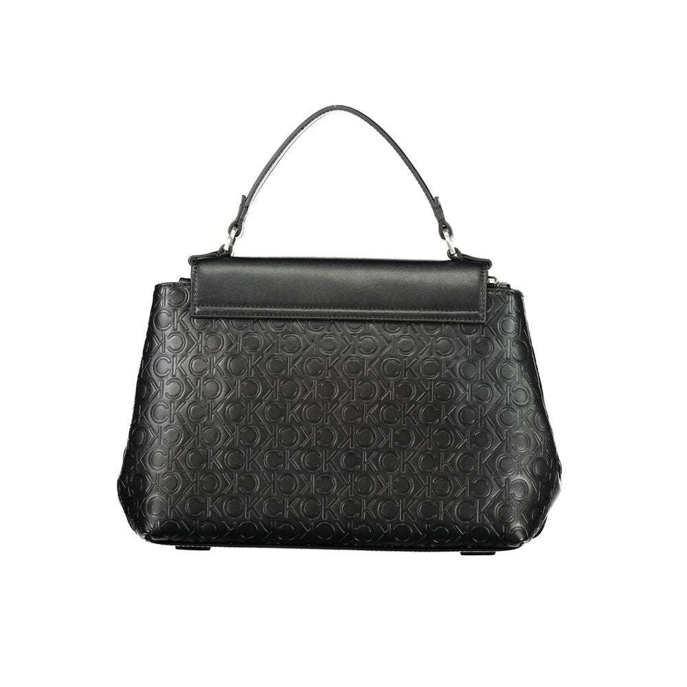 Black Calvin Klein polyester women's handbag with sleek design and top handle, featuring subtle branding and zipper closure.