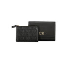 Calvin Klein black polyester women's wallet with multiple card slots and a sleek design, ideal for everyday use.